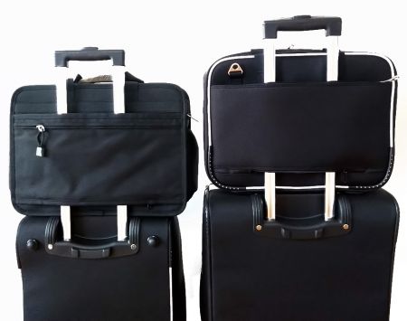 Les porte-documents pour ordinateur sont conçus pour reposer sur le dessus d'une valise